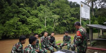 Satgas Pamtas Yonarmed 11 Kostrad Perketat Perbatasan dengan Patroli Patok