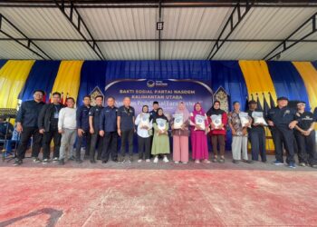 NasDem Kaltara Bagikan 1.100 Sak Beras Premium kepada Warga di Tarakan