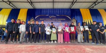 NasDem Kaltara Bagikan 1.100 Sak Beras Premium kepada Warga di Tarakan