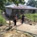 Satgas TMMD dan Warga Gotong Royong Bangun Fasilitas Sumur Bor di Kampung Satu Skip
